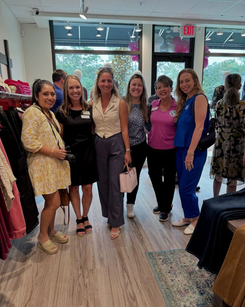boutique shoppers at grand opening