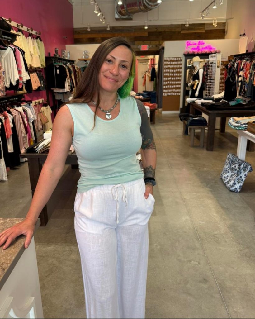 woman standing in a boutique